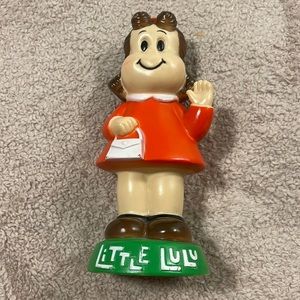 Little Lulu Holding Purse green base plastic bank from the 70’s Vintage